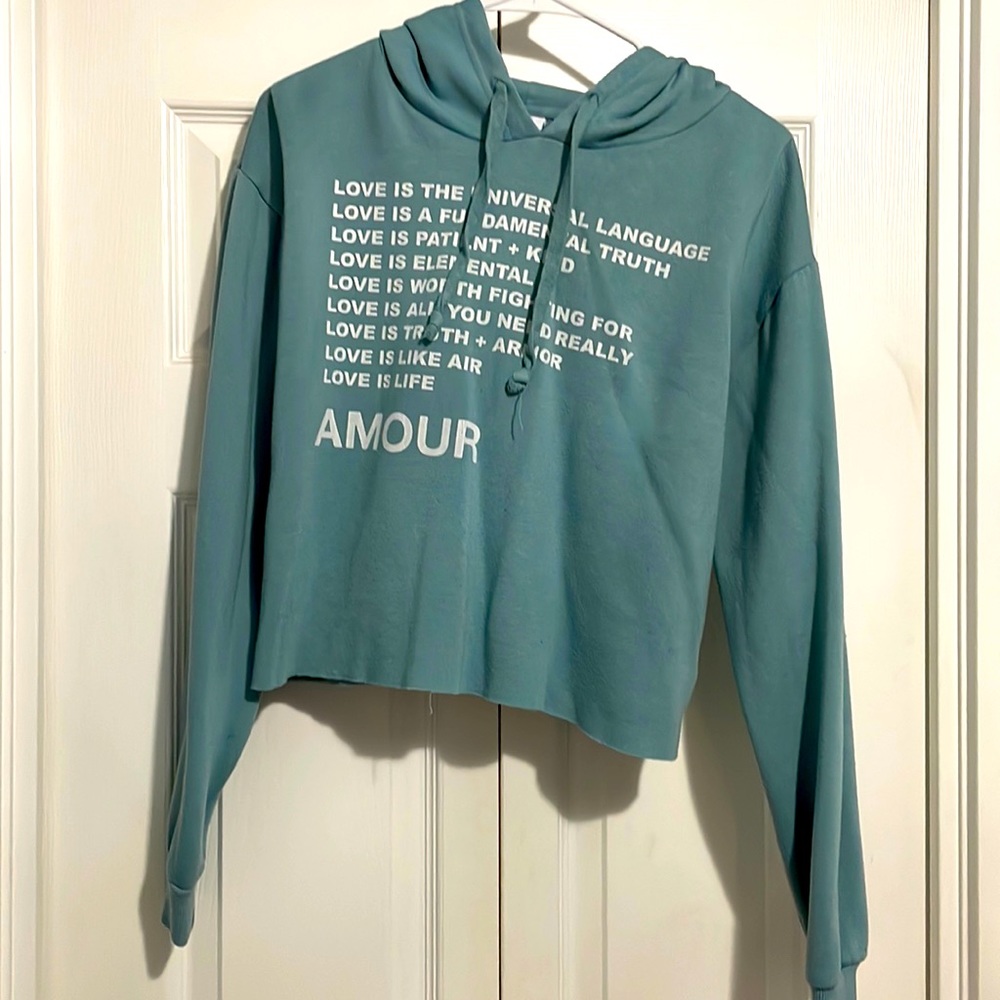 Girls XL: Love is… cropped sweatshirt